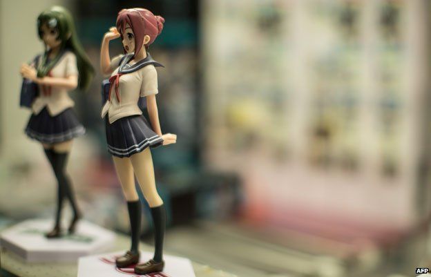 Figurines of schoolgirls