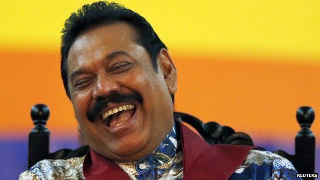Sri Lankan President Mahinda Rajapaksa smiles during his final rally ahead of presidential election in Piliyandala January 5, 2015.