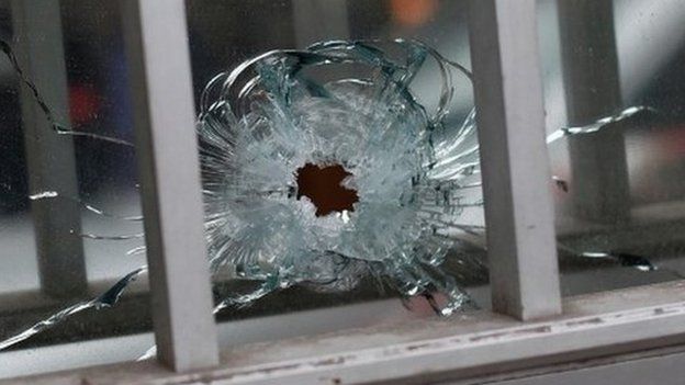 A bullet hole in a building near the Charlie Hebdo offices