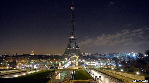As a tribute for the victims of yesterday's terrorist attack the lights of the Eiffel Tower were turned off for five minutes at 20:00 on 8 January 2015 in Paris, France.