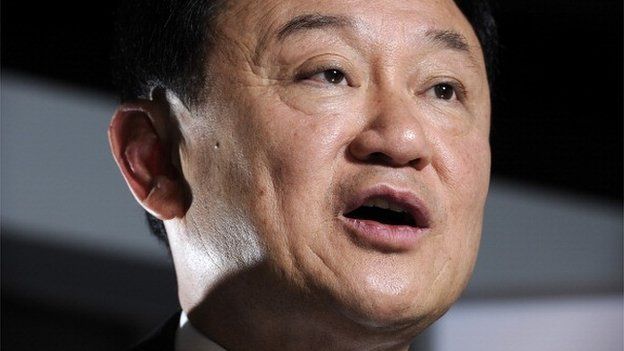 Thaksin Shinawatra, former prime minister of Thailand, speaks during an interview in Singapore, on Monday, Sept. 24, 2012.