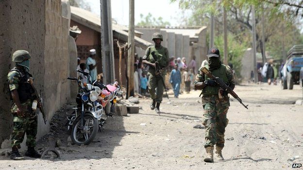 Nigerian soldiers patrol the remote northeast town of Baga, Borno State - 30 April 2013