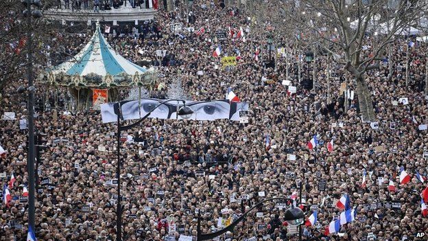 Hundreds of thousands of people marched through Paris on Sunday