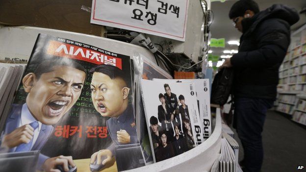 A magazine with caricatures of US President Barack Obama and North Korean leader Kim Jong-un is displayed at a book store in Seoul