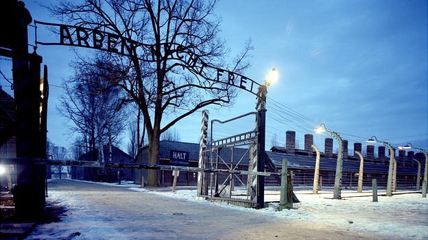 The entrance to Auschwitz-Birkenau concentration camp in Oswiecim, Poland, with the words Arbeit Mach Frei (work makes you free) on the gates. It is now part of The Auschwitz-Birkenau State Museum