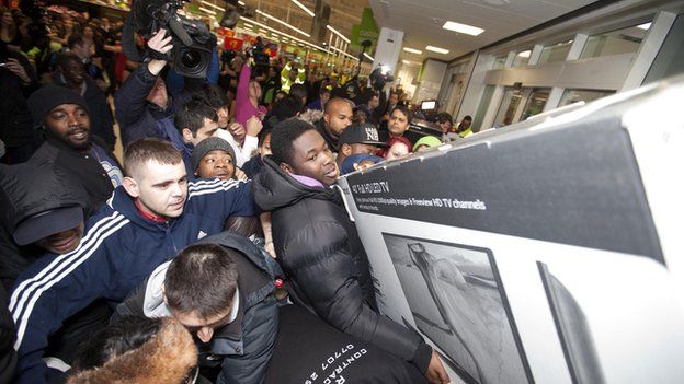 Shoppers at the Asda store in Wembley, north west London, take advantage of the stores Black Friday offers