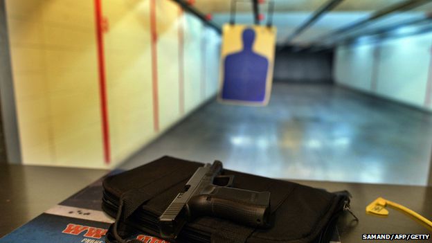 A handgun is seen on a counter at a firing range in the US on 26 November 2014