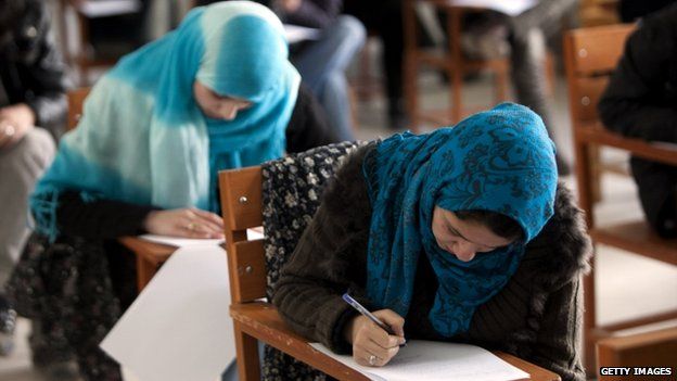 Afghan women take an exam at Kabul university