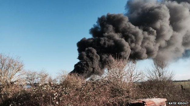 Wollaston fire at recycling site prompts safety warning - BBC News