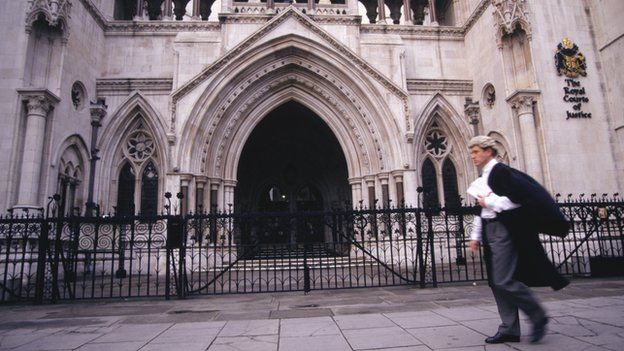 Barrister walking past a court
