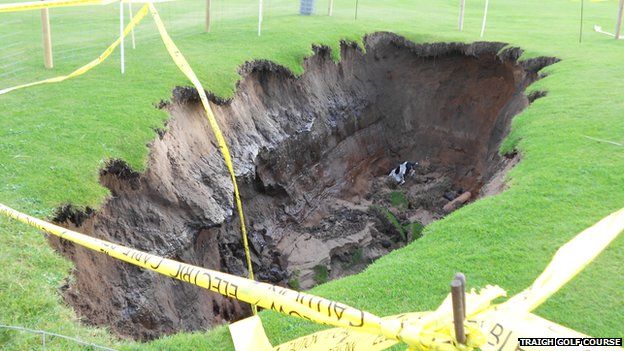 Large sinkhole appears on golf course - BBC News