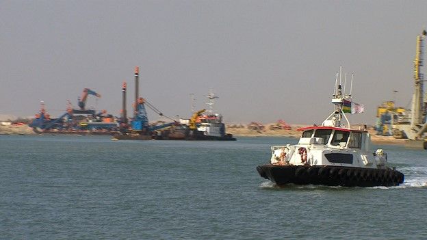Dredgers work on the second Suez Canal