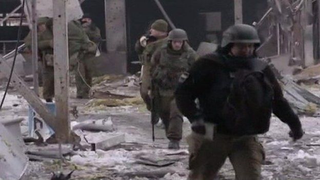 Still of rebels at Donetsk airport (18 Jan)