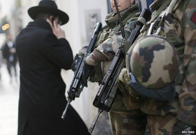 French soldiers patrol a Jewish neighbourhood in Paris, 20 January