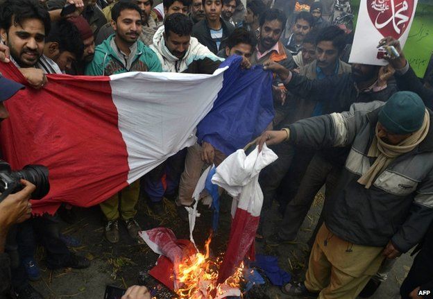 Pakistani traders burn French flags in Lahore, 21 January