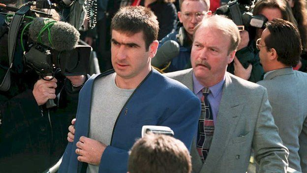 Eric Cantona arrives at court ahead of his hearing