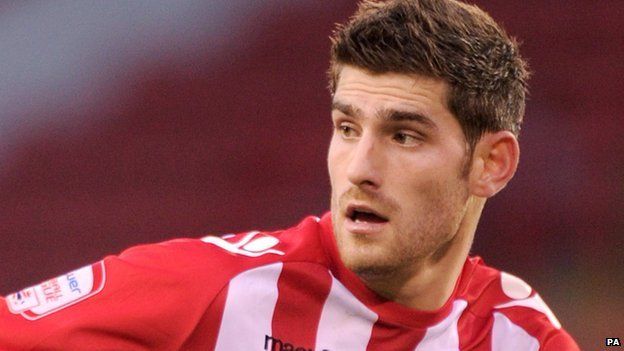 Ched Evans: Threat to Oldham Athletic sponsor at time of talks - BBC News