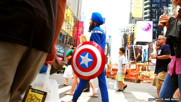 Singh crossing the street in Times Square