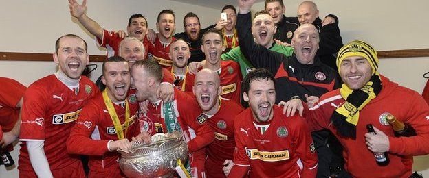A familiar sight in local football - Cliftonville celebrating another League Cup success
