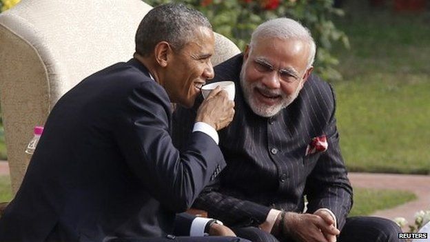 U.S. President Barack Obama and Indian PM Narendra Modi talk as they have coffee and tea together in the gardens of Hyderabad House in Delhi January 25, 2015.