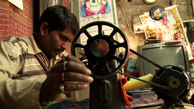 Santosh at his sewing machine