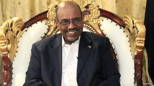 Sudan's President Omar al-Bashir smiles during an interview at the presidential palace in Khartoum