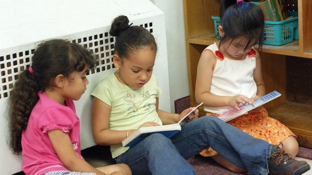 children reading in a library