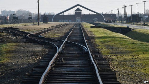 A giant tent is erected over the Gate of Death (far background) at Auschwitz II-Birkenau ahead of the 70th anniversary of the liberation of the camp.