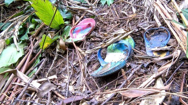 Abandoned sandals in the bush in Burundi (January 2015)