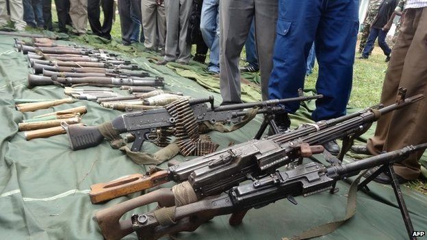 Burundian army men present on 6 January 2015 in Cibitoke, arms they say they they captured from rebels in the north-western part of the country.