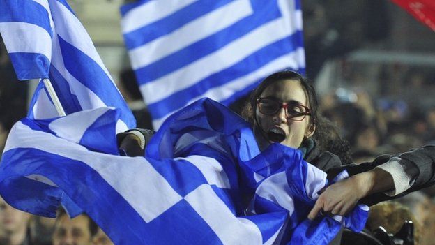 Syriza supporter with Greek flag