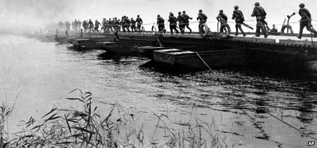 Soviet troops cross a pontoon bridge at the Western Bug in July 1944, as part of Operation Bagration