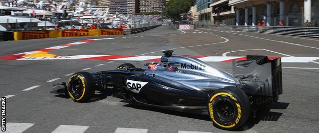 Jenson Button's McLaren tackles the Swimming Pool section in Monaco