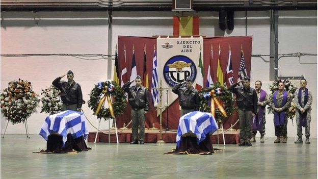 Compatriots salute the coffins of the two Greek pilots who died on 26 January in the plane accident at Los Llanos air base in Albacete.