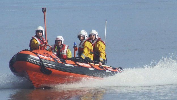 A SARA lifeboat and crew in action