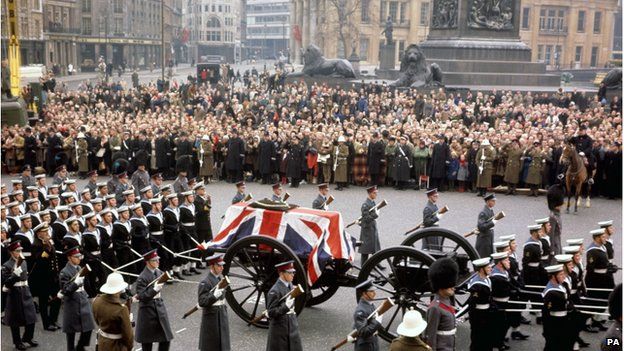 Churchill's coffin in a procession passing through Trafalgar Square
