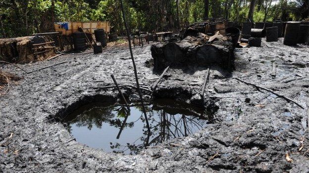 Locally built illegal oil refineries operated by oil thieves in Bayelsa state of the Niger Delta, 11 April 2013
