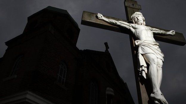 Crucifix in a churchyard in England