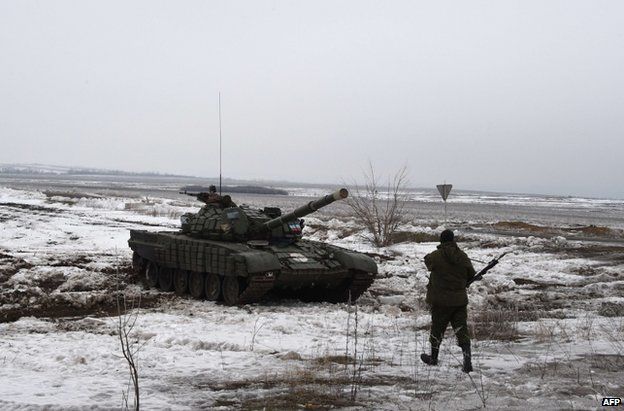 A rebel tank stands 25 km from the east Ukrainian town of Debaltseve, 29 January
