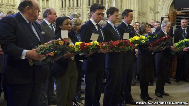 Sir Nicholas Soames, Nathania Ewruje, Labour leader Ed Miliband, Liberal Democrat leader Nick Clegg, Prime Minister David Cameron, Baroness D'Souza and Speaker of the Commons John Bercow during a memorial service for Sir Winston Churchill in Westminster Hall, London