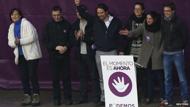 Pablo Iglesias with other Podemos leaders on stage at rally - 31 January