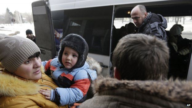 Debaltseve civilians board a bus to leave the town. Photo: 31 January 2015
