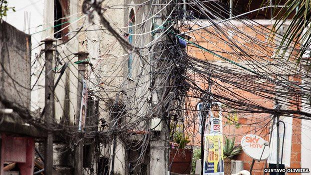 Chaotically strung cables can be seen in Vila Uniao in January 2015