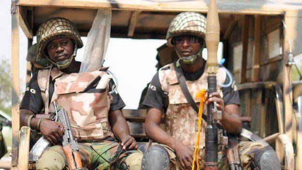 Nigerian soldiers ready for a patrol in the north of Borno state
