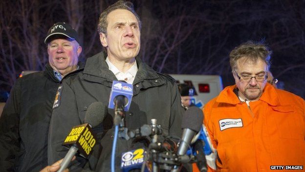 New York Governor Andrew Cuomo speaks to the media at the site of a Metro-North commuter train crash 3 February 2015