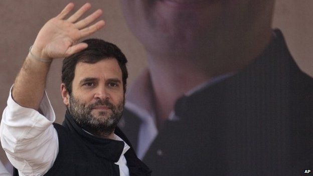 India's opposition Congress party Vice President Rahul Gandhi waves to the crowd during an election campaign rally ahead of Delhi state election in New Delhi, India, Wednesday, Feb. 4, 2015
