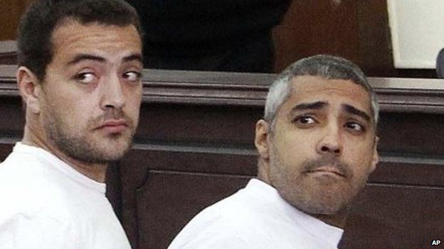 Baher Mohamed and Mohamed Fahmy in court in Cairo (31 March 2014)