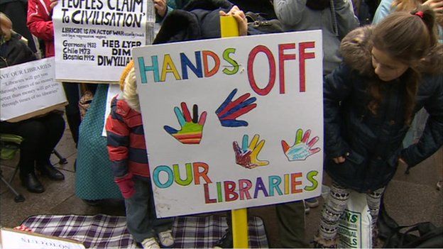 Hands off our libraries banner