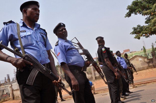 Nigerian police patrol the Nigerian capital, Abuja, 7 February