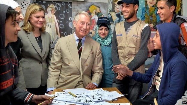 Prince Charles in a classroom at the Za'atri refugee camp, with International Development Secretary Justine Greening